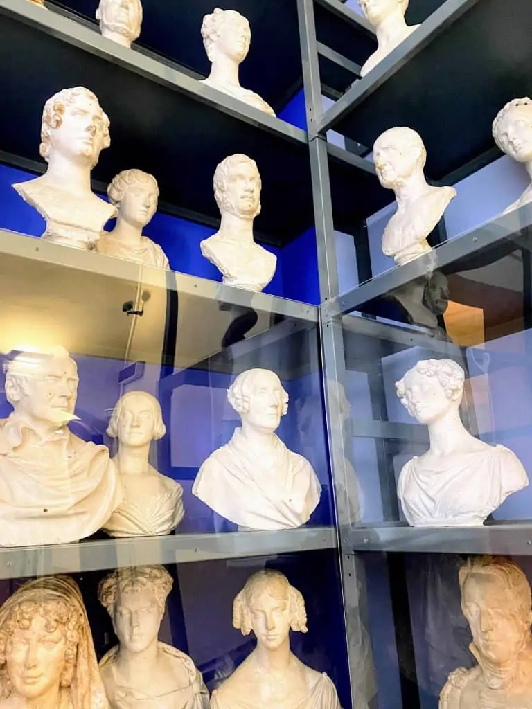 marble busts on display at the Accademia Gallery in Florence, Italy