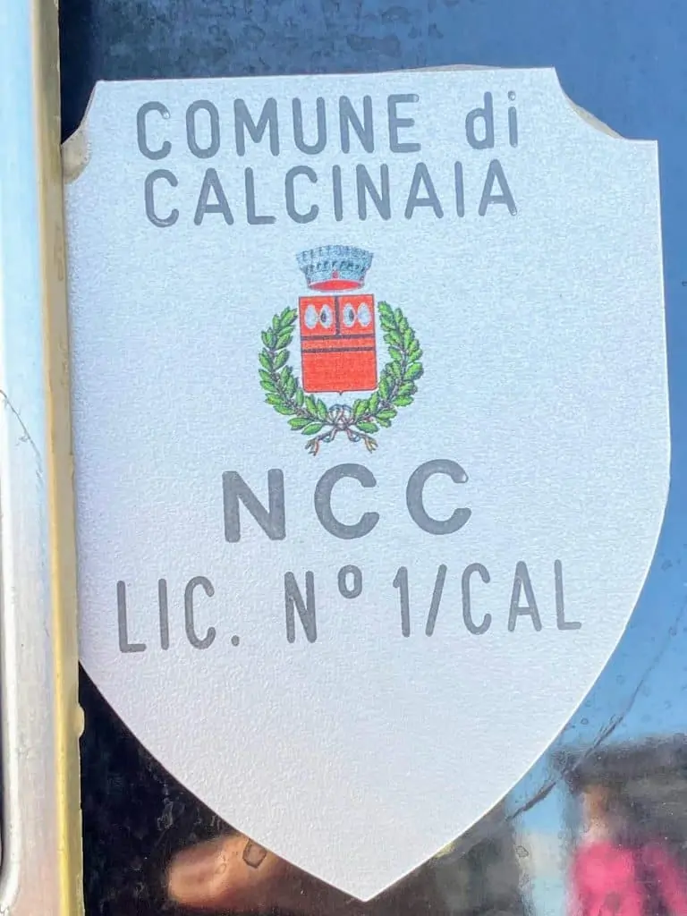 ncc decal close up from the back of a private driver's van