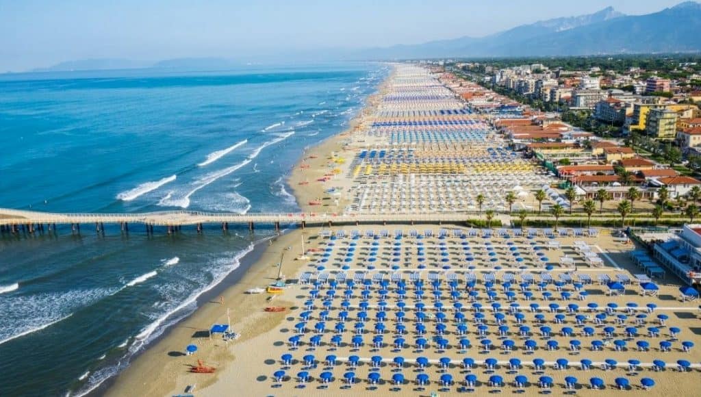 Aerial view of the beach clubs and pier of Lido di Camaiore, Italy