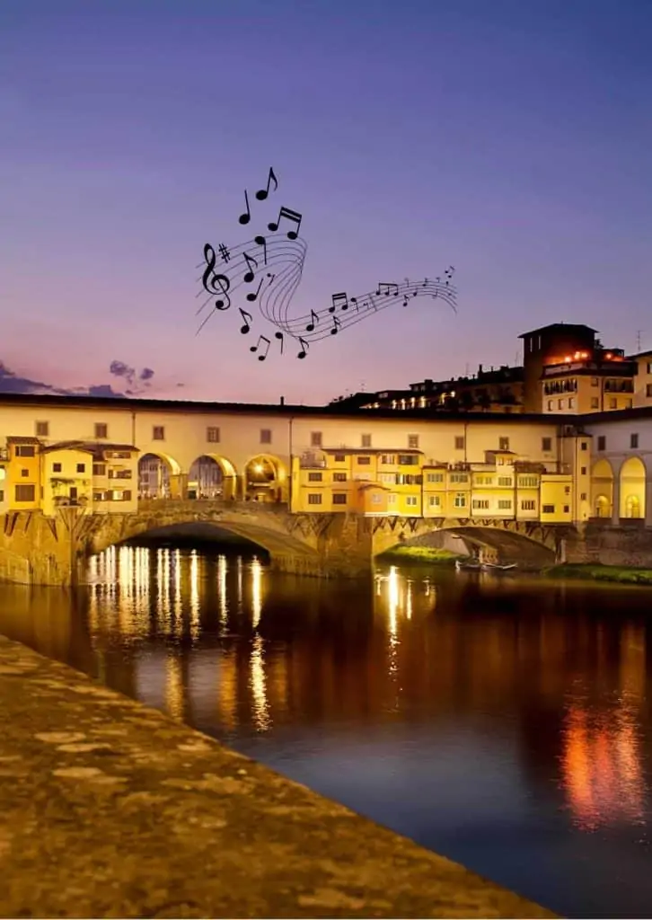 The Ponte Vecchio in Florence, Italy at sunset.  The photo is taken from the Oltrarno side of the Arno river.  There are graphic music notes above the bridge, in the sky.