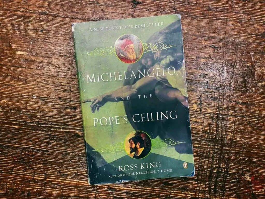 Michelangelo & the Pope's Ceiling book sitting on a wooden table top.