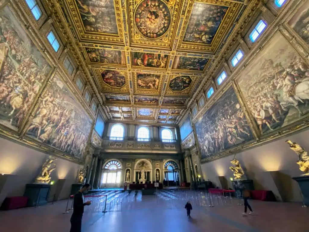 The Hall of 500 (Salone del Cinquecento) inside Palazzo Vecchio in Florence, Italy.  It houses one of Michelangelo's sculptures, the Genius of Victory.