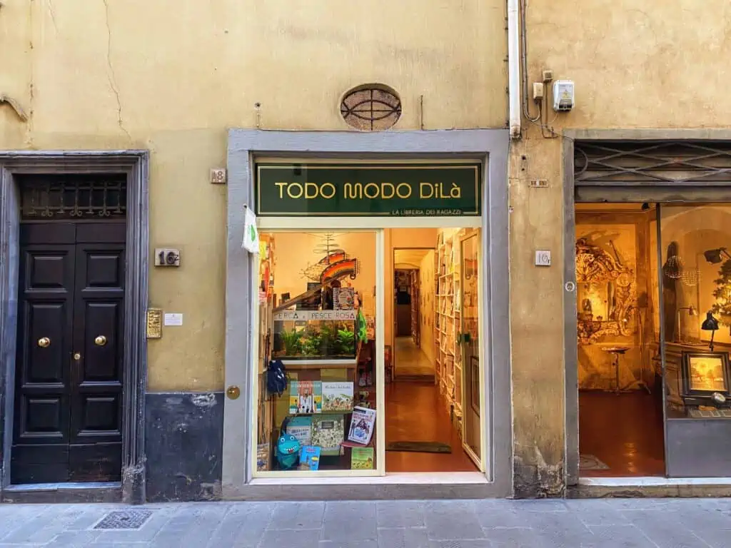 Storefront of Todo Modo Dilà children's bookstore in Florence, Italy.
