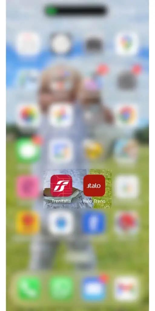 Screenshot of phone with apps.  All are blurred except for Trenitalia and Italo Treno.