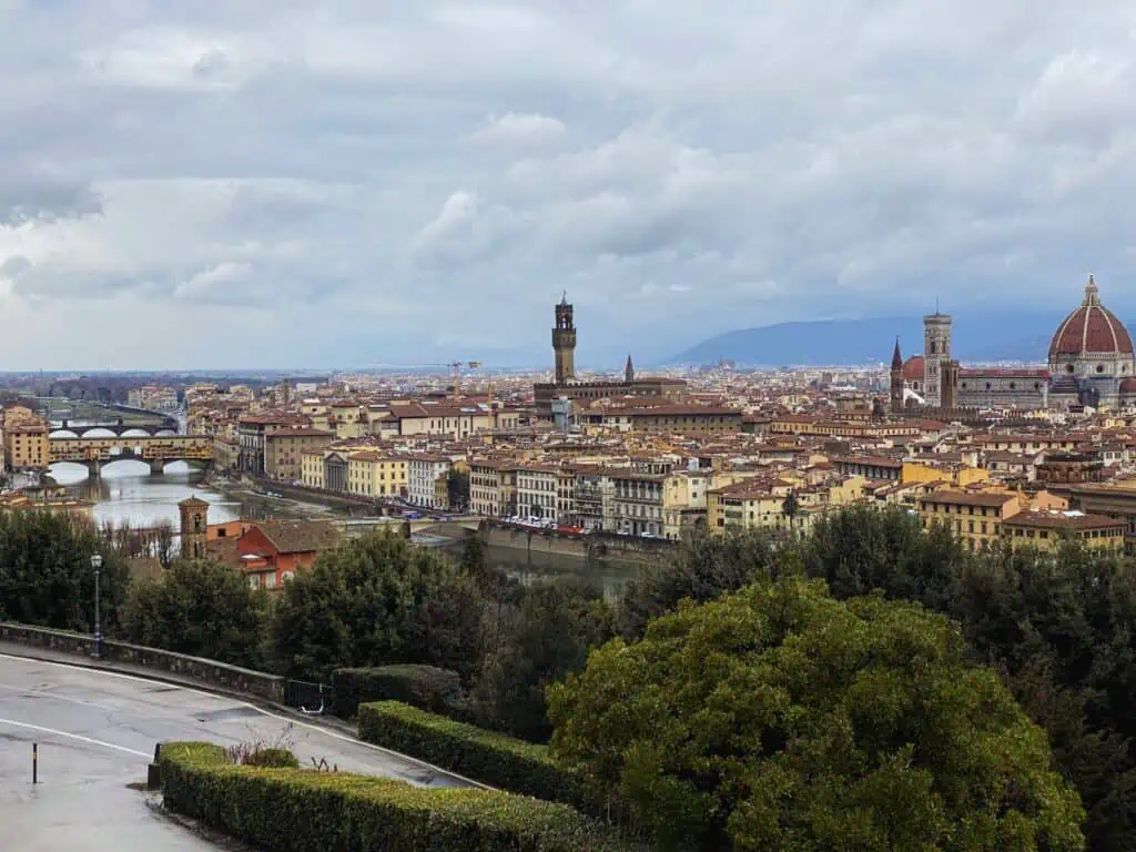 View of Florence skyline from Piazzale Michelangelo on a cloudy day.