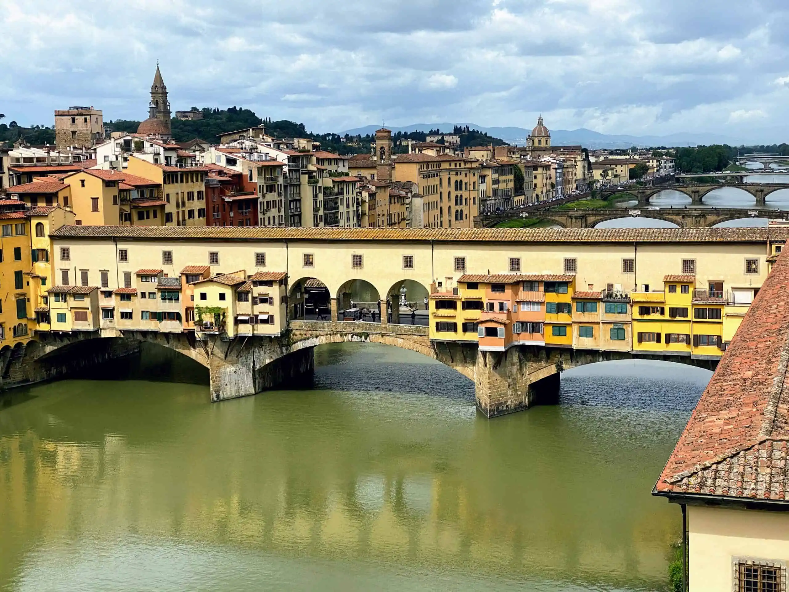 View of Ponte Vecchio from upper floor of Uffizi Gallery in Florence.