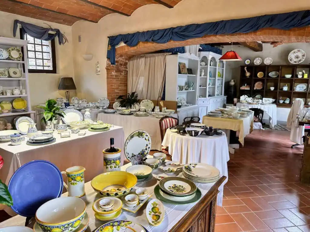 Ceramics on display at a small workshop and showroom (see it in back left) in Gaiole in Chianti in Tuscany, Italy.