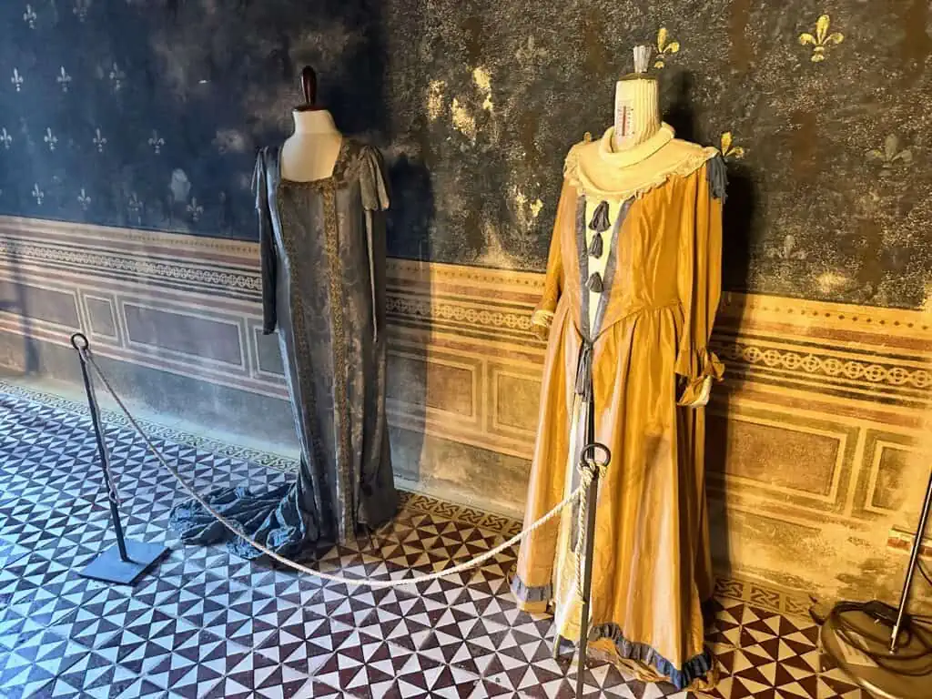 Two dresses inside the museum in the fortress of Capalbio, Tuscany.