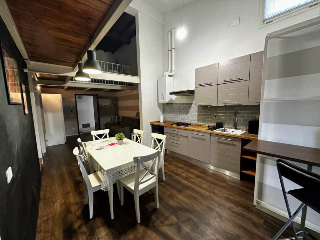 Kitchen and dining table in apartment in Florence, Italy.