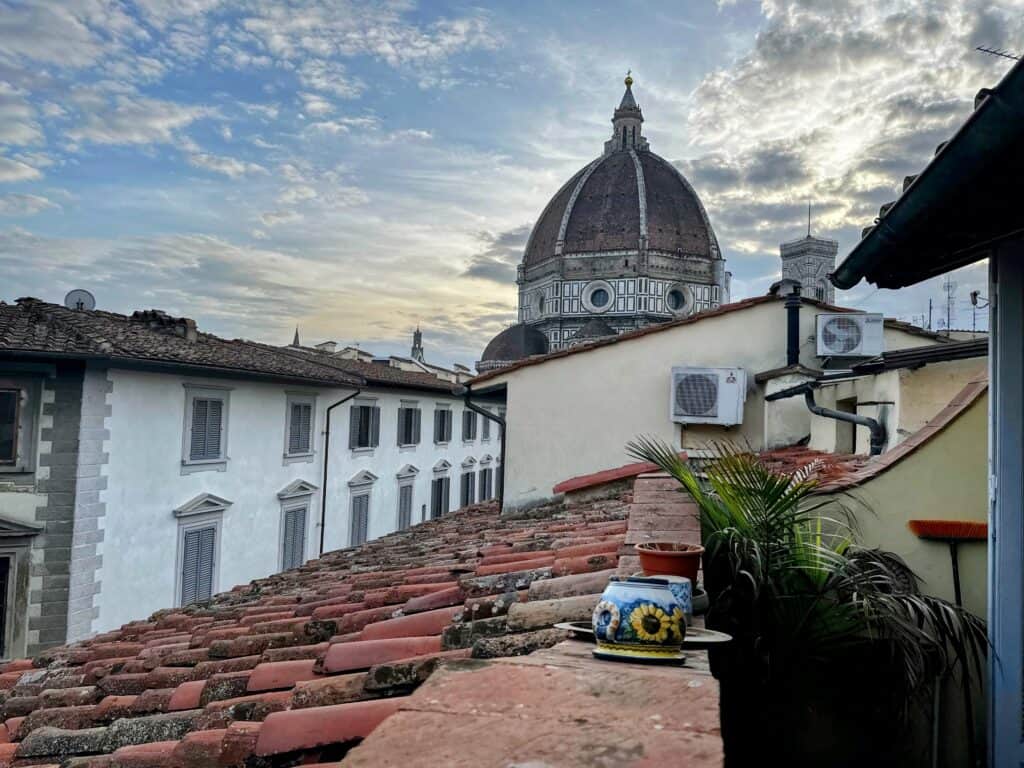 View of Florence's Duomo from the rooftop terrace of an apartment.